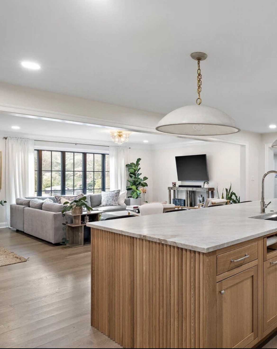 Featured project — open kitchen and living with layered lighting
